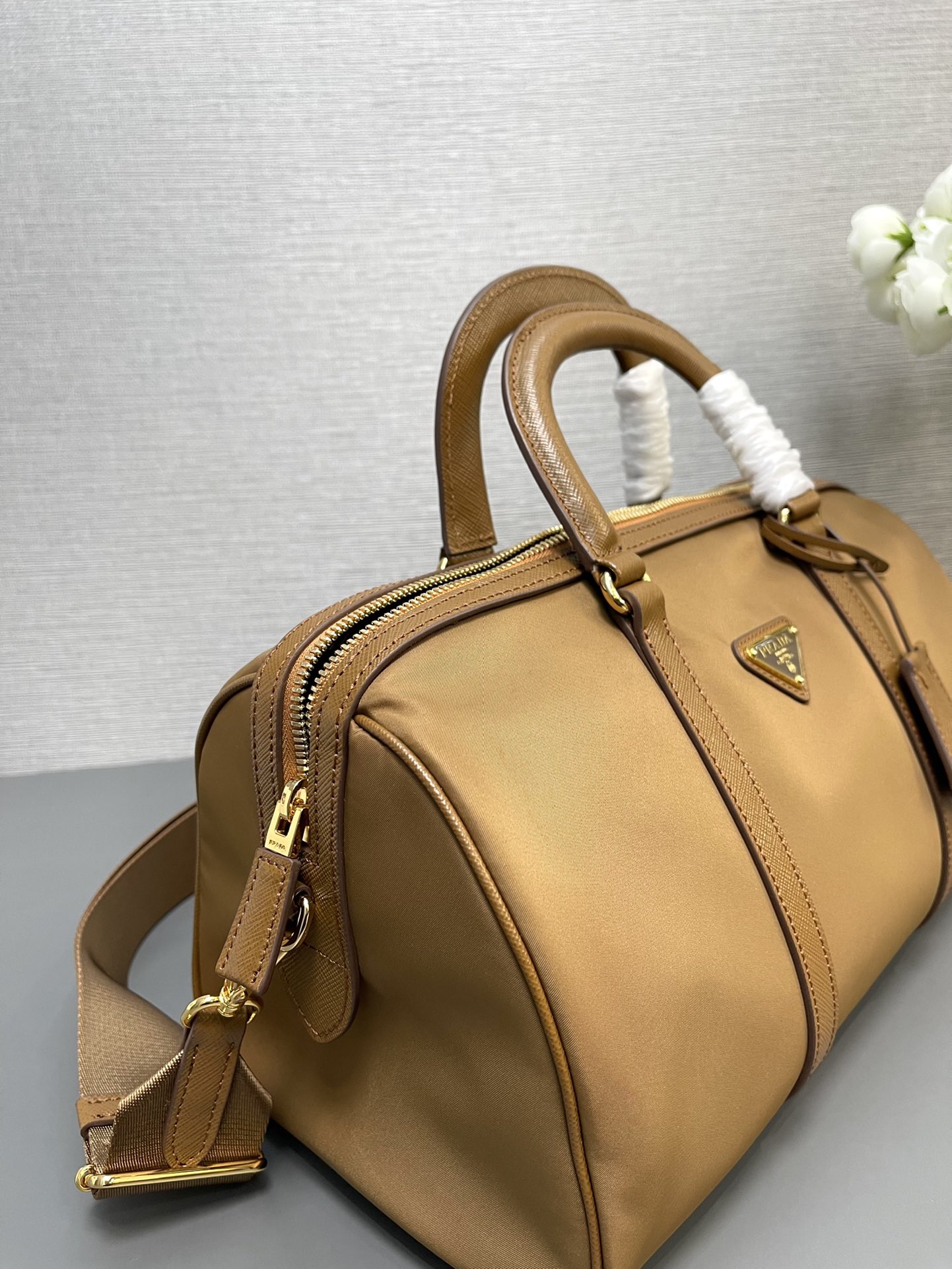 Prada Re Edition 1978 medium ReNylon And Saffiano Leather Top Handle Bag Cork Beige 1BB233